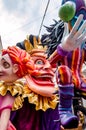 Giant Multicolored Sculpture on a Carnival Float. Annual Celebration Events with Moving Statues, Masks, Costumes and a Big Parade