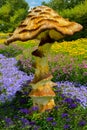 Giant Mushroom amongst flowers