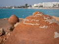 Giant old pots on Nissi beach in Ayia Napa, Cyprus. Delightful sea holidays Royalty Free Stock Photo