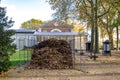 A giant pile of leaves collected in gardens at Luxembourg Palace, Paris
