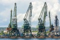 Giant port cranes at cargo terminal