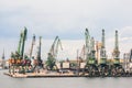 Giant port cranes at cargo terminal