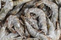 Giant prawns, shrimps in retail pack. White background. Top view