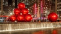 Giant red Christmas ornaments on 6th Avenue with holiday season decorations. New York City