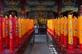 Giant Red and Gold Candles Lighted on an Altar chinese temple sh