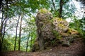 Giant rock near the road.