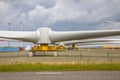 Giant rotors of wind turbine on construction yard