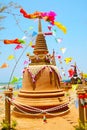 Giant sand pagoda and colorful flags was carefully built, and beautifully decorated in Songkran festival Royalty Free Stock Photo