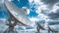 giant satellite dishes cloudy sky Royalty Free Stock Photo