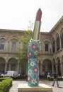 Giant sculpture of a lipstick by Alessandro Mendini