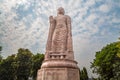 Standing Buddha 80 feet tall at Wat Thai monastery Sarnath, Varanasi, India.