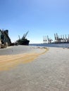 A giant ship in the anchorage and huge cranes