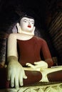 Giant sitting Buddha inside of the Kudianye temple in Bagan, Myanmar