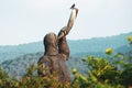 Giant soldier holding horn statue monument in Didgori - historical site memorial