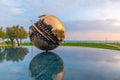 Giant sphere of A. Pomodoro in Pesaro, Italy