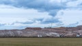 Giant spreader or absetzer machinery. A large dumper on a landfill with potash ore. Extracting potassium salts.