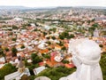 Giant statue of woman holding bowl. Mother of Georgia top view close up in Tbilisi. USSR architecture and legacy. Georgian art