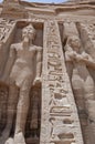 Giant statues of Ramses II and Nefertari at Abu Simbel temple Royalty Free Stock Photo