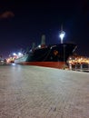 A giant steamship in a port