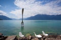 Giant steel fork in water of Geneva lake, Vevey, Switzerland Royalty Free Stock Photo