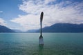Giant steel fork in water of Geneva lake, Vevey, Switzerland Royalty Free Stock Photo