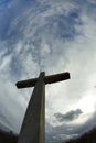 Giant Stone cross against dramatic sky Royalty Free Stock Photo