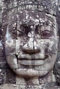 Giant stone face of Prasat Bayon temple, Cambodia Royalty Free Stock Photo