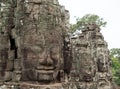 Giant stone faces at Prasat Bayon, Angkor Wat Royalty Free Stock Photo