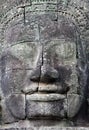 Giant stone faces at Prasat Bayon Temple, Cambodia Royalty Free Stock Photo