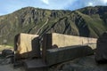 Giant stone pillars sit on top of Temple Hill at the peak of the Ollantaytambo ruins in Peru.