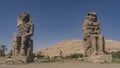 Giant stone sculptures of the Colossi of Memnon in Egypt.