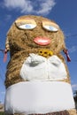 Giant straw puppet