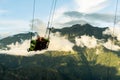 Giant swing on Tungurahua volcano in Andes range in Ecuador