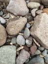 Rocks on white sand beach