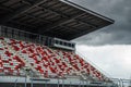 Giant tribune with colorized seats Royalty Free Stock Photo