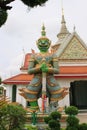 The Giant Wat Chaeng standing guardian at the entrance of the ordination hall in Wat Arun Ratchawararam Temple.