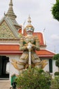 The Giant Wat Chaeng standing guardian at the entrance of the ordination hall in Wat Arun Ratchawararam Temple.