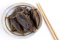 Giant Water Bug is edible insect for eating as food Insects deep-fried crispy snack on plate and chopsticks on white background, Royalty Free Stock Photo