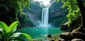 Giant waterfall plunges into emerald pool, dense Thai rainforest, pool, view Royalty Free Stock Photo