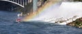 Giant Waterfalls with Mist coming of Cruise Ship tourist Ship Niagara Falls on the US Canadian Border with Hornblower Boats Tour