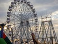 Giant wheel carnival ride or Ferris wheel flyer ride in indian village fair ground at night Royalty Free Stock Photo