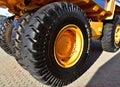 Giant wheels and tires on huge mining truck BELAZ with logo BELSHINA JSC production of one of the largest automobile tire