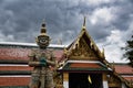 Giant Yak, Yaksha statue with large teeth, piercing eye with sword in hand protecting and guarding the famous Temple of the