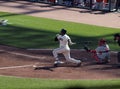 Giants Batter Juan Uribe connects with pitch