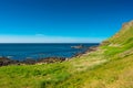 Giants Causeway Aerial view most popular and famous attraction in Northern Ireland.Hills on Coast of Atlantic ocean, summer time