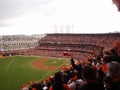 Giants fans throughout the ballpark cheer as they waving rags as