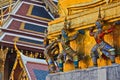 Giants and monkeys hand to lift golden pagoda Royalty Free Stock Photo