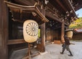 Giants paper lanterns adorned by imperial coat of arms at the gate of Meiji-Jingu Shrine.