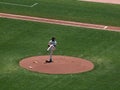 Giants Pitcher lifts leg to begin pitch from mound