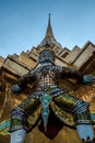 Giants sculpture standing in front of Pagoda in The Royal Grand Palace, Bangkok, Thailand Royalty Free Stock Photo